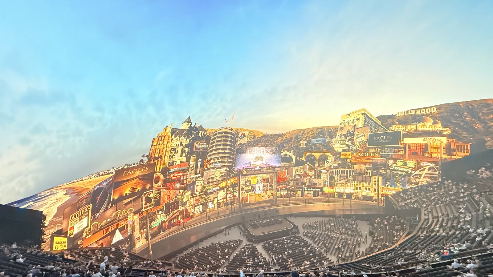 Sphere dome with a Hollywood panorama projection honoring the Eagles: billboards, the Capitol Records building and the Hollywood sign